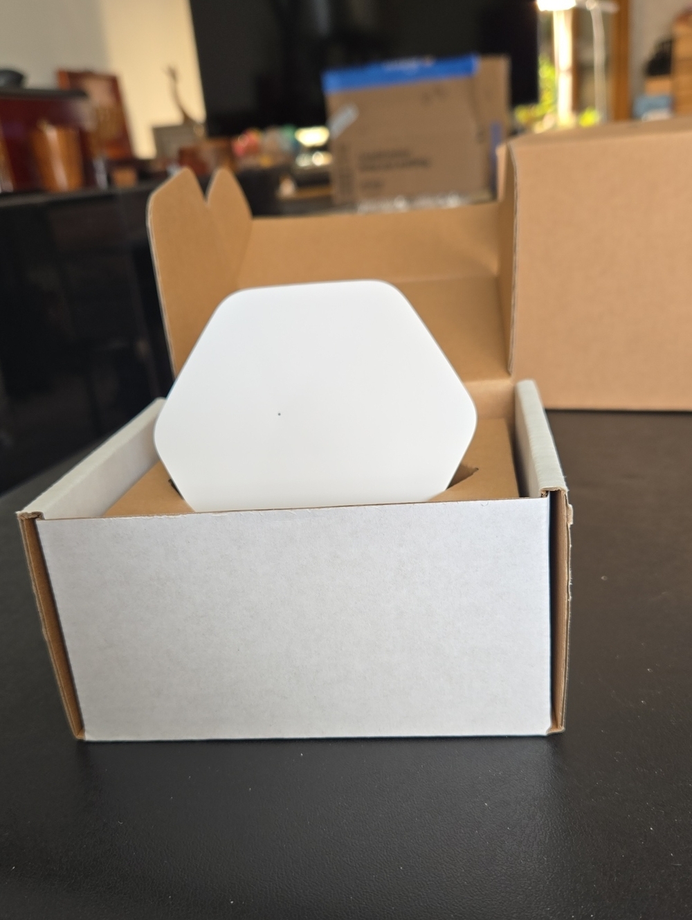 White Hexagonal Wireless Networking Device